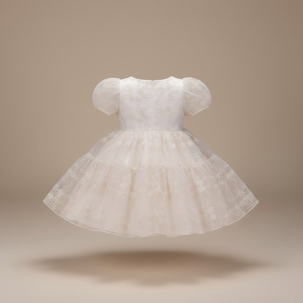 Julie Dausell off-white Cleo tulle dress with puff sleeves and delicate floral embroidery for special occasions.